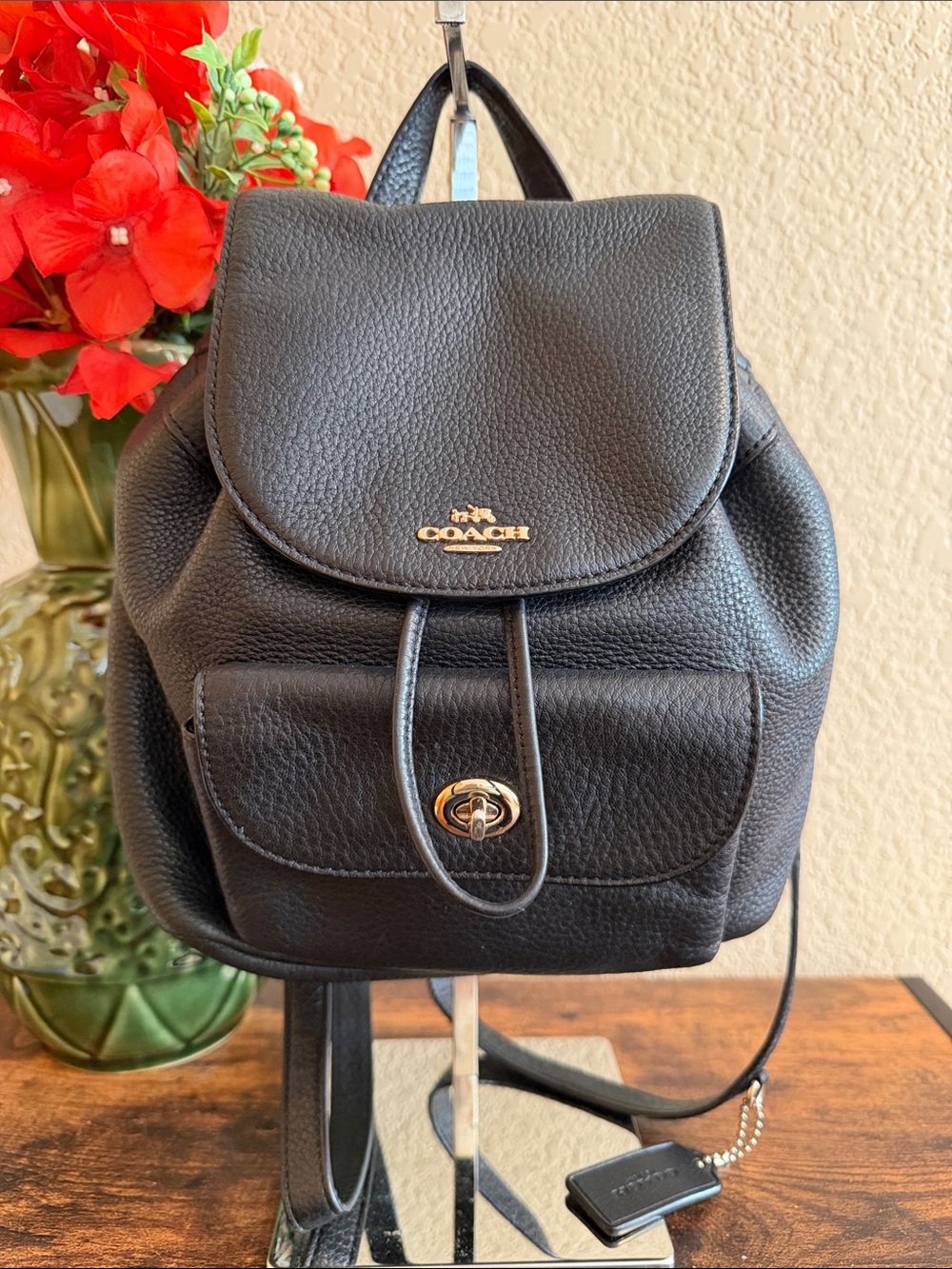 Coach black mini pebble leather backpack